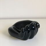 Empty black enamelled hand-shaped ceramic pocket, 1970