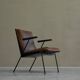 Modernist Dutch lounge chair in enamelled steel and leather from the 1950s.
