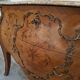 Commode style Louis XV en marqueterie et bois de rose