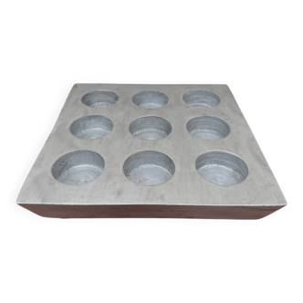 Brutalist style brushed aluminum candle holder