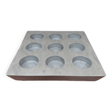 Brutalist style brushed aluminum candle holder