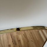 Asymmetrical brass mirror
