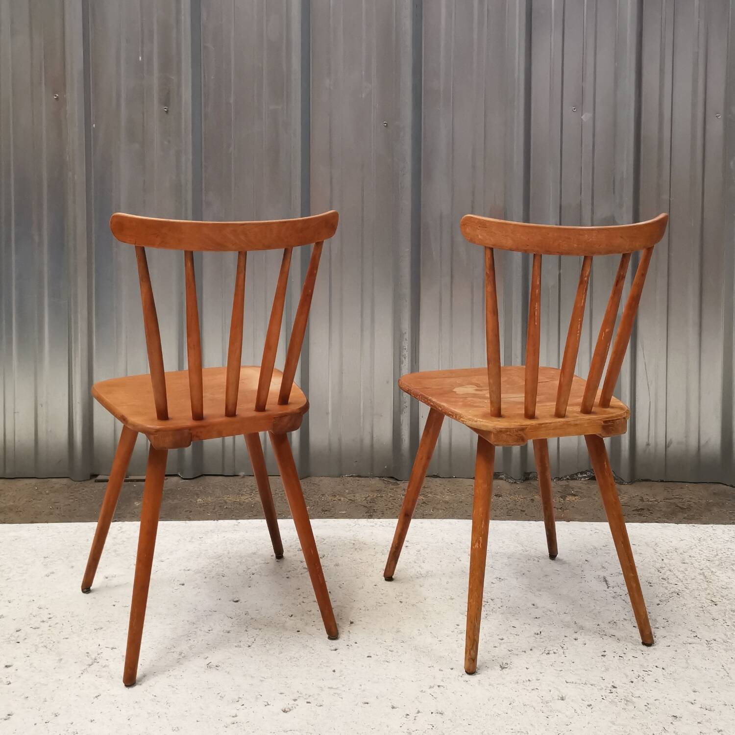 Pair of bistro chairs with bars