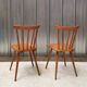 Pair of bistro chairs with bars