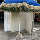 Blue parasol and flowers