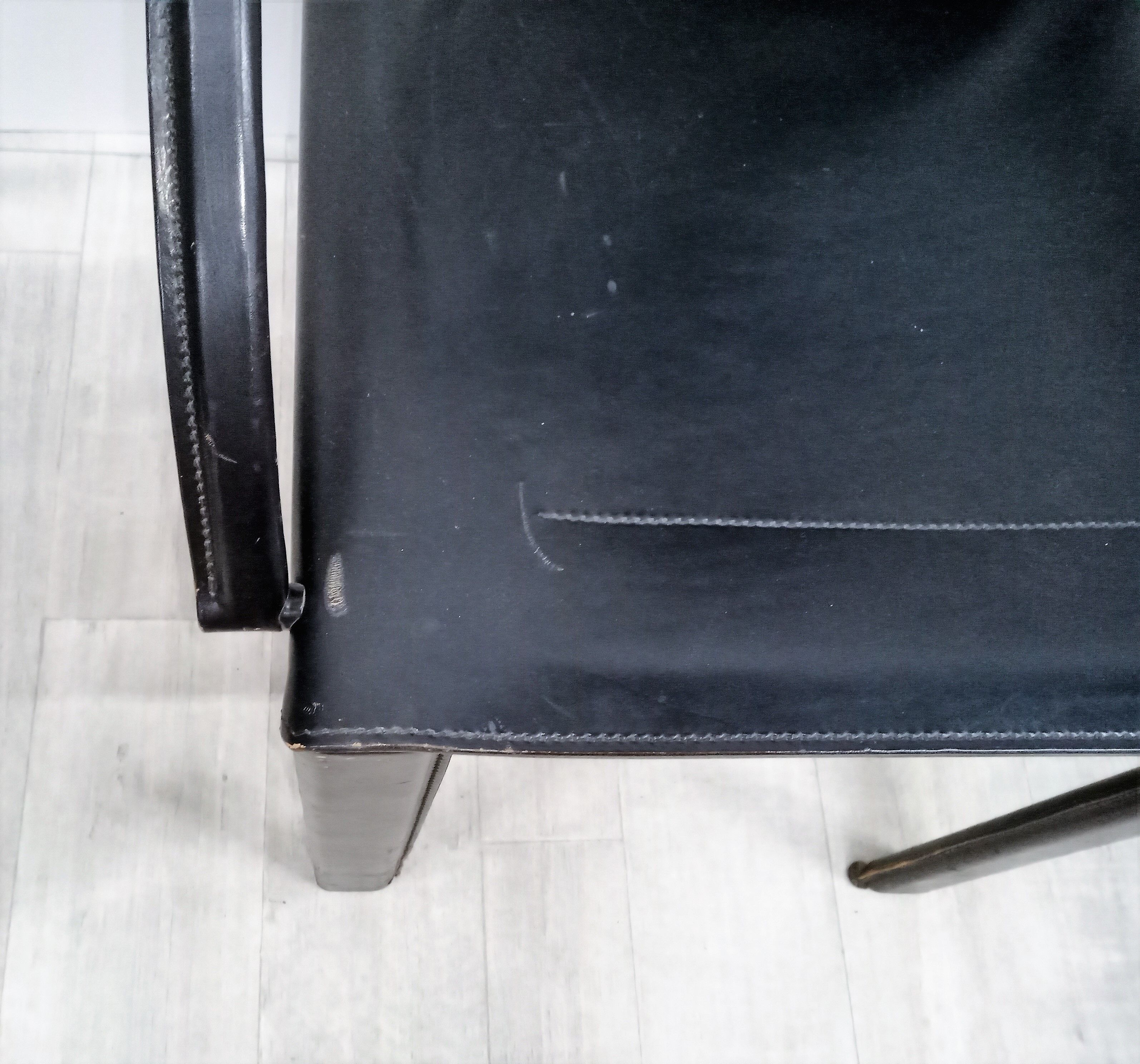 Black leather coral chairs by Matteo Grassi