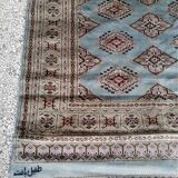 Old oriental carpet made hands. Signature. (175 x 125 )