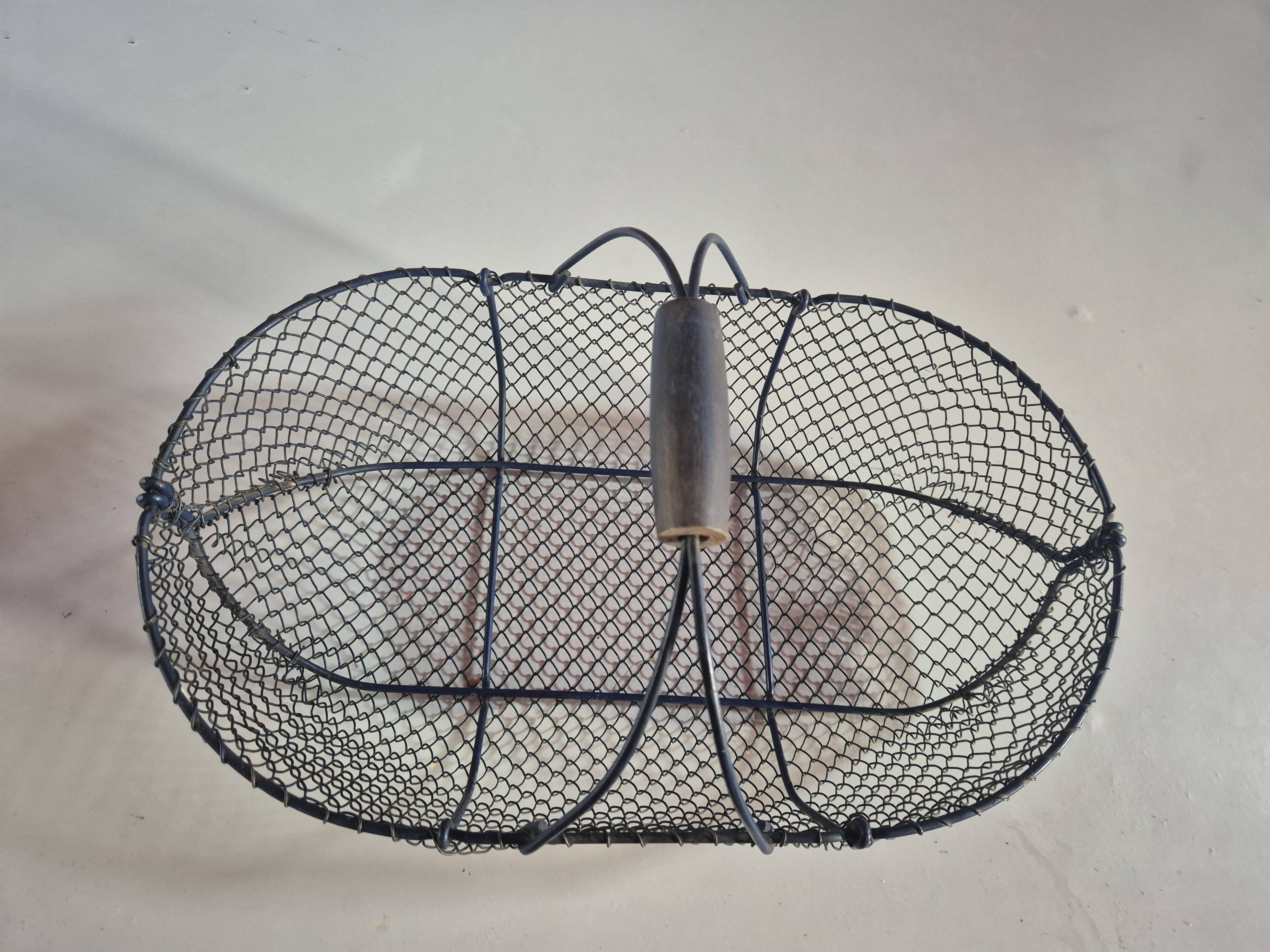 Vintage navy blue metal basket with wooden handle