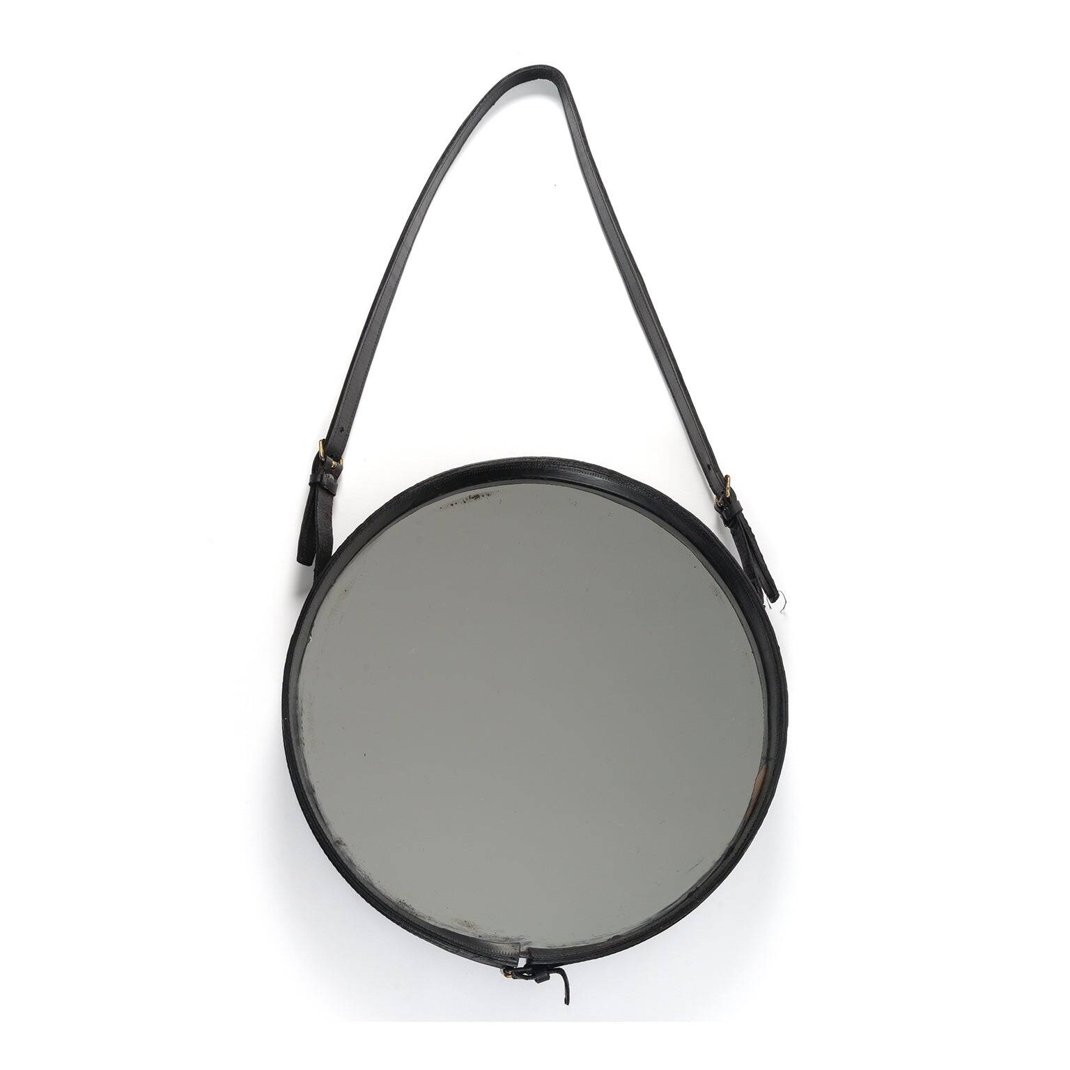 Leather strap mirror attributed to Jacques Adnet, France, 1950s.