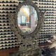 Psyche mirror in brass