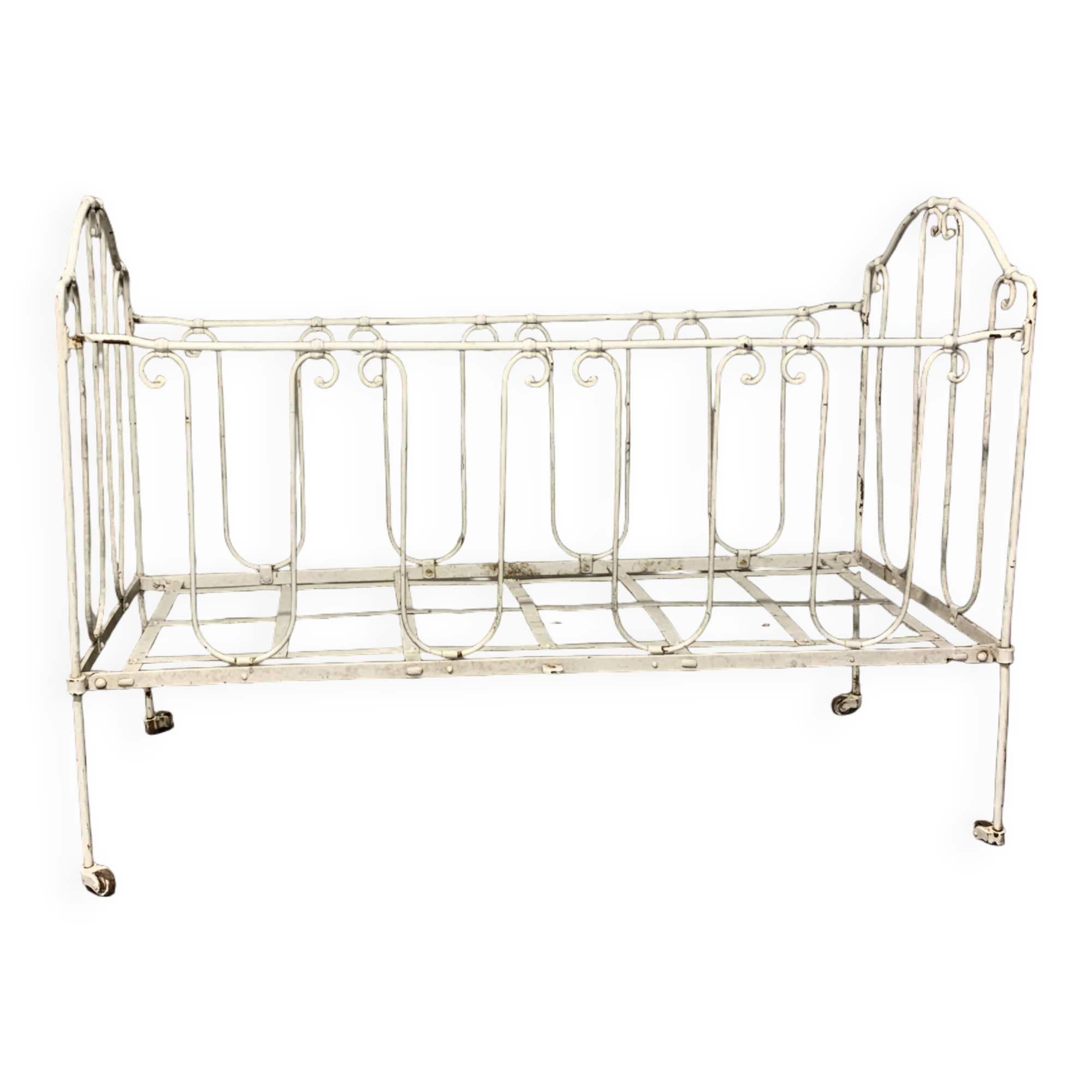 Old vintage wrought iron bench bed