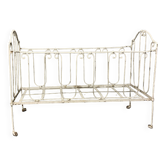 Old vintage wrought iron bench bed