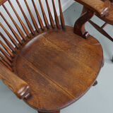 Pair of English Edwardian Oak Spindle Back Captains Office Desk Chairs