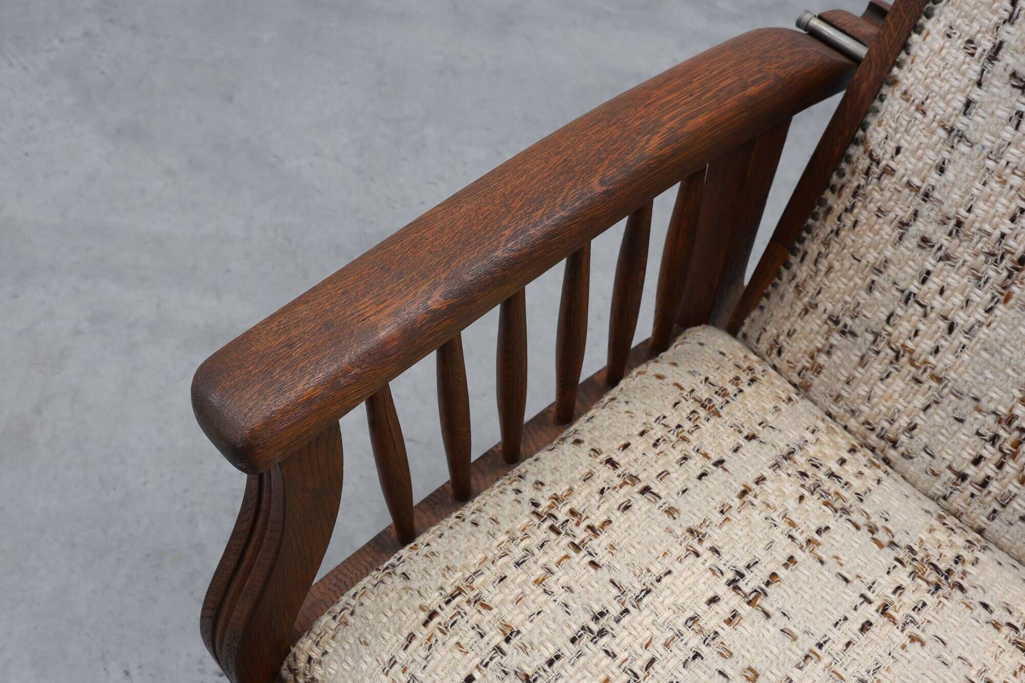 Arts & Craft oak armchair with spindle sides and tweed upholstery, Belgium