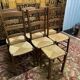 6 high-backed straw chairs