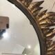 Sun mirror decorated with golden leaves, circa 1950.