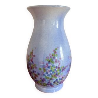 Large blue vase with pastel flowers