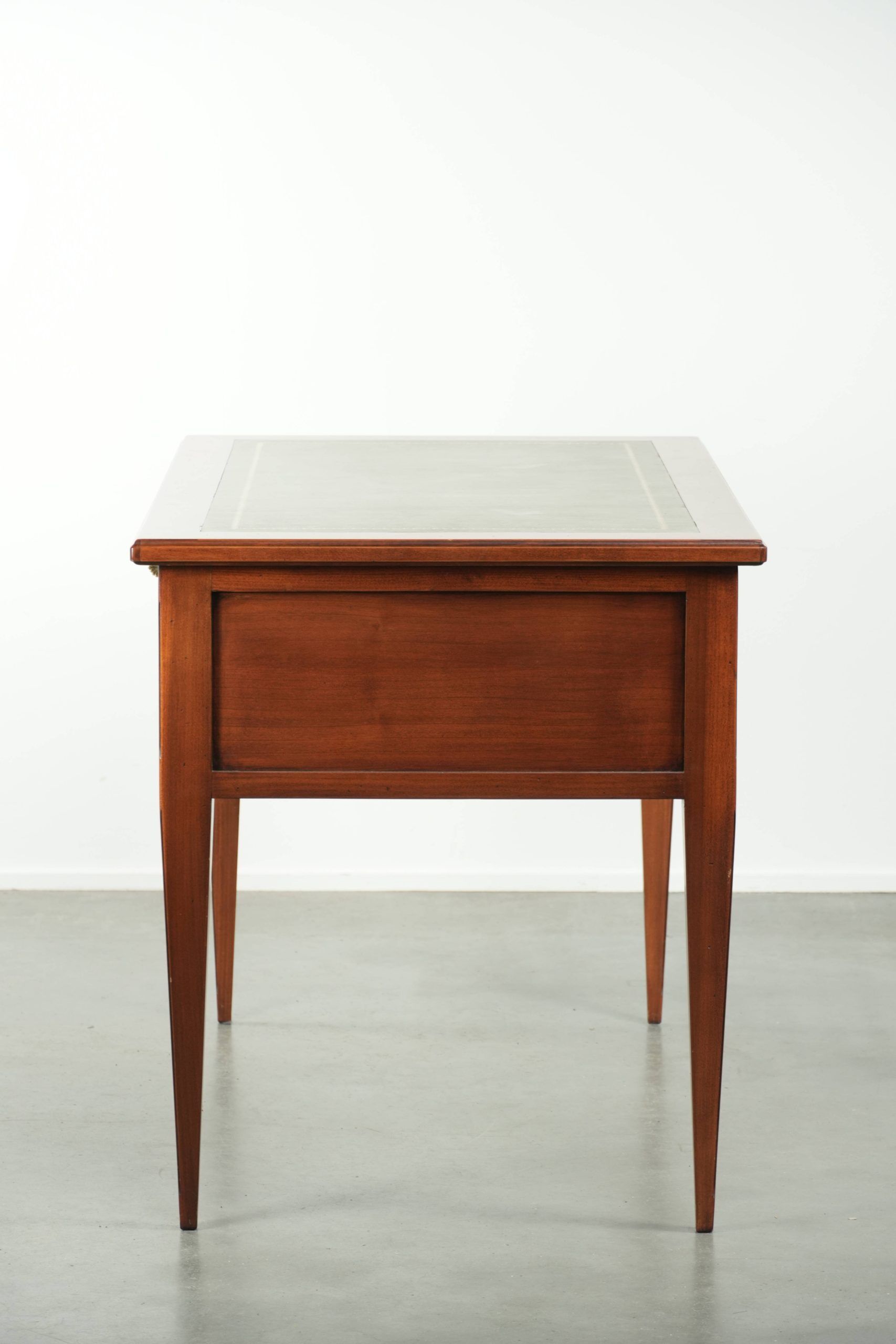 Elegant English style desk with green leather top, gold details and drawers