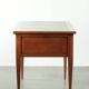 Elegant English style desk with green leather top, gold details and drawers