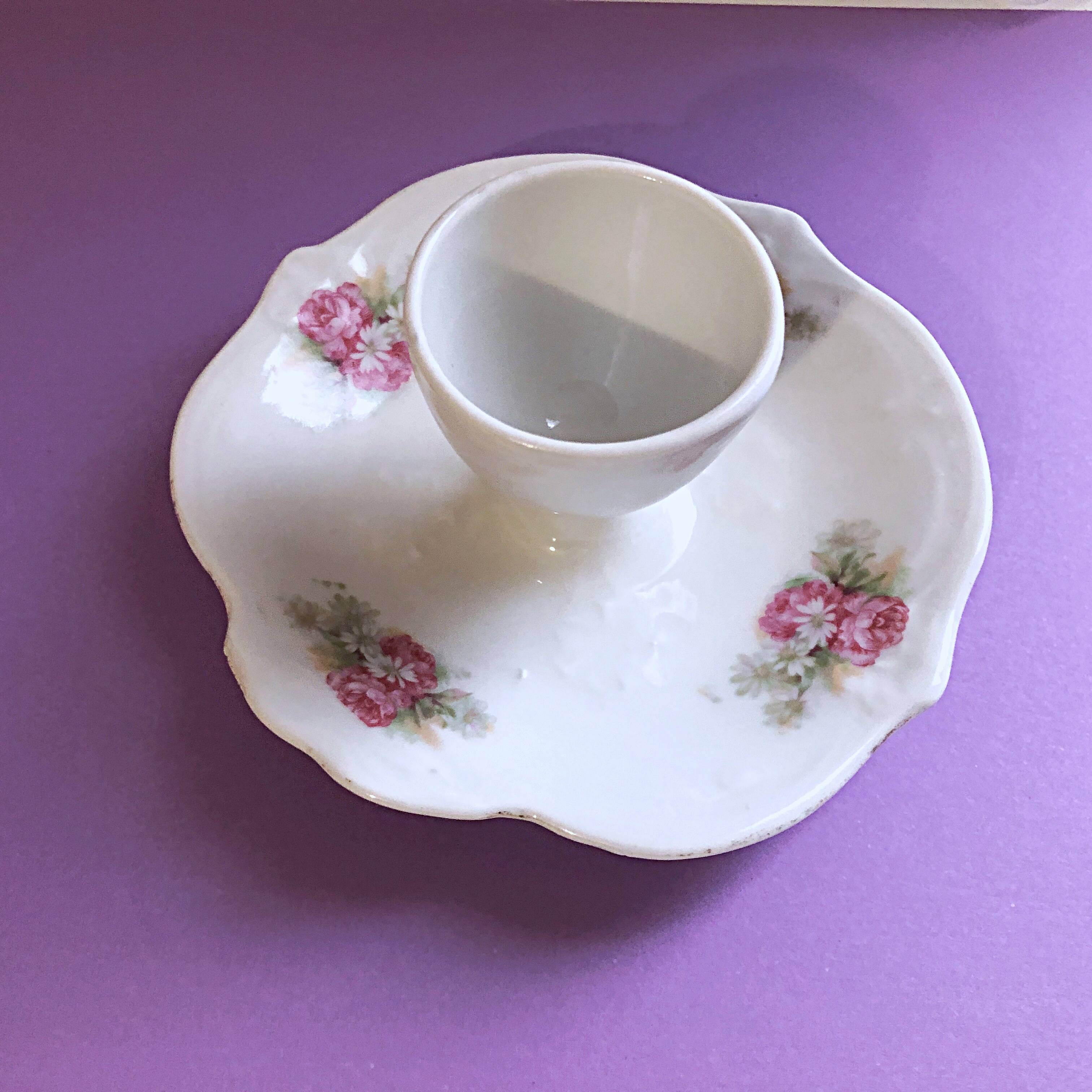 Porcelain egg cup with shabby chic style floral bouquet decoration Romanticism