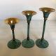 Set of candlesticks with green patina and brass Memphis