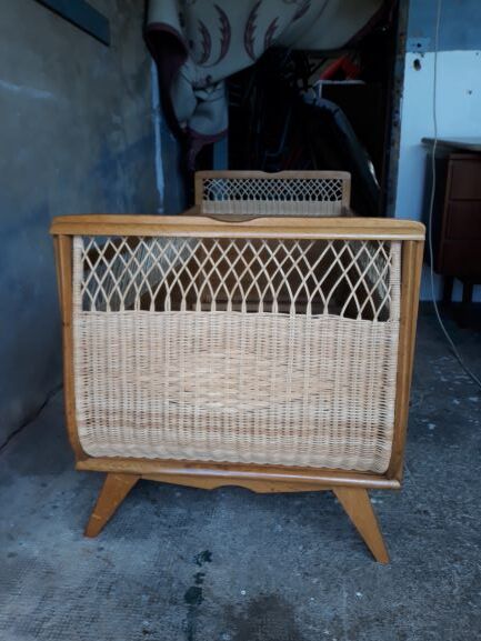 Wooden baby bed and vintage rattan