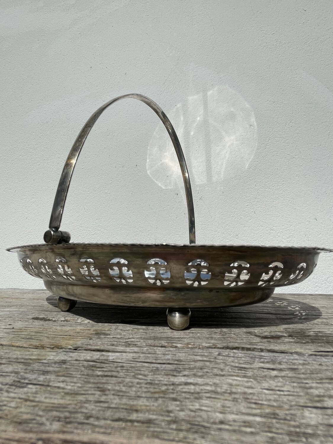 Oval dish with silver-plated metal handle