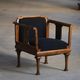 Early 20th century Danish Art Nouveau armchair, reupholstered in charcoal boucle.