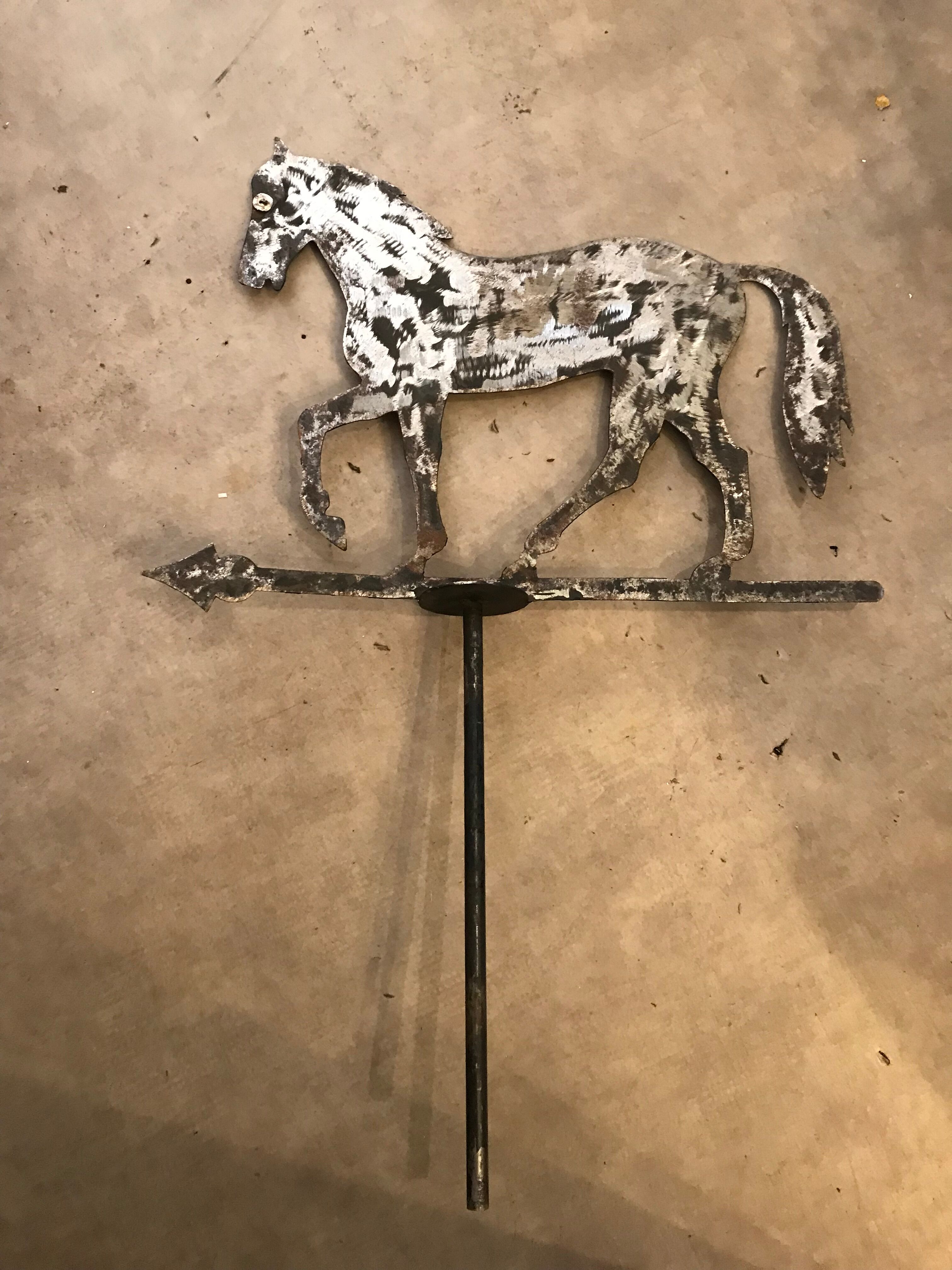 Horse-shaped weather vane in brushed steel artisanal work by ironworker