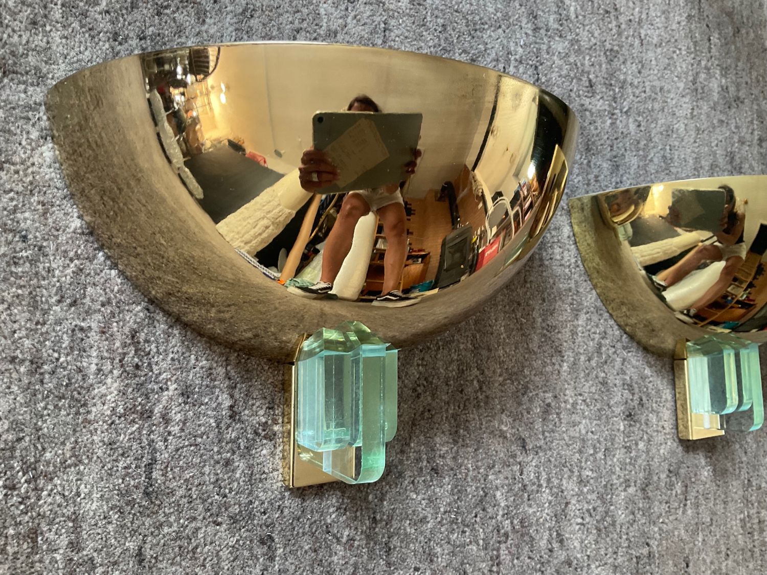 Pair of Hollywood Regency half-moon wall lamps in gilded metal and plexiglass