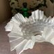 Transparent molded glass suspension in flower shape