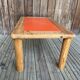Modernist pine and orange lacquered coffee table, 1970s