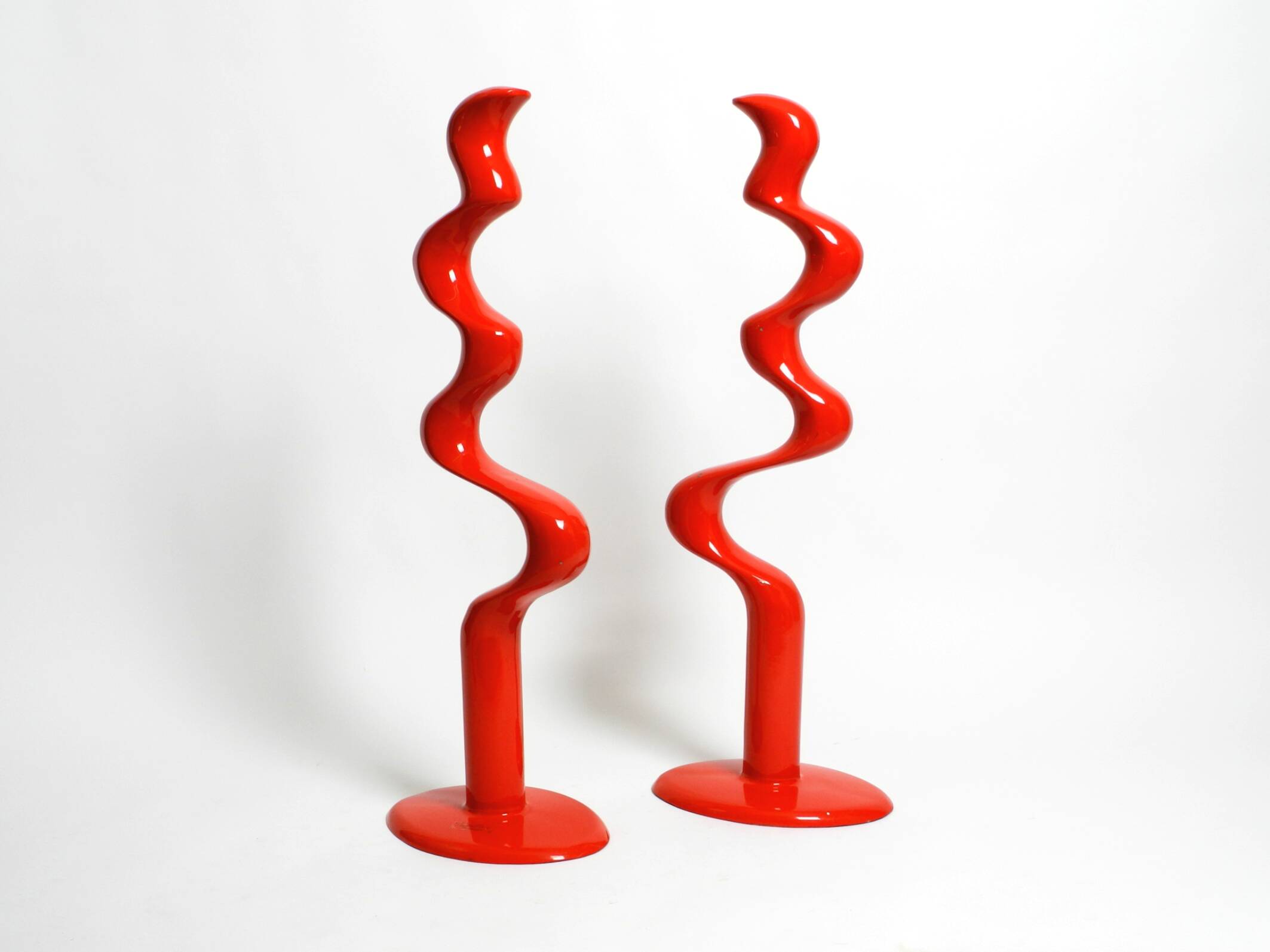 Two large limited abstract metal floor sculptures in red