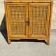 Vintage wood and rattan chest of drawers