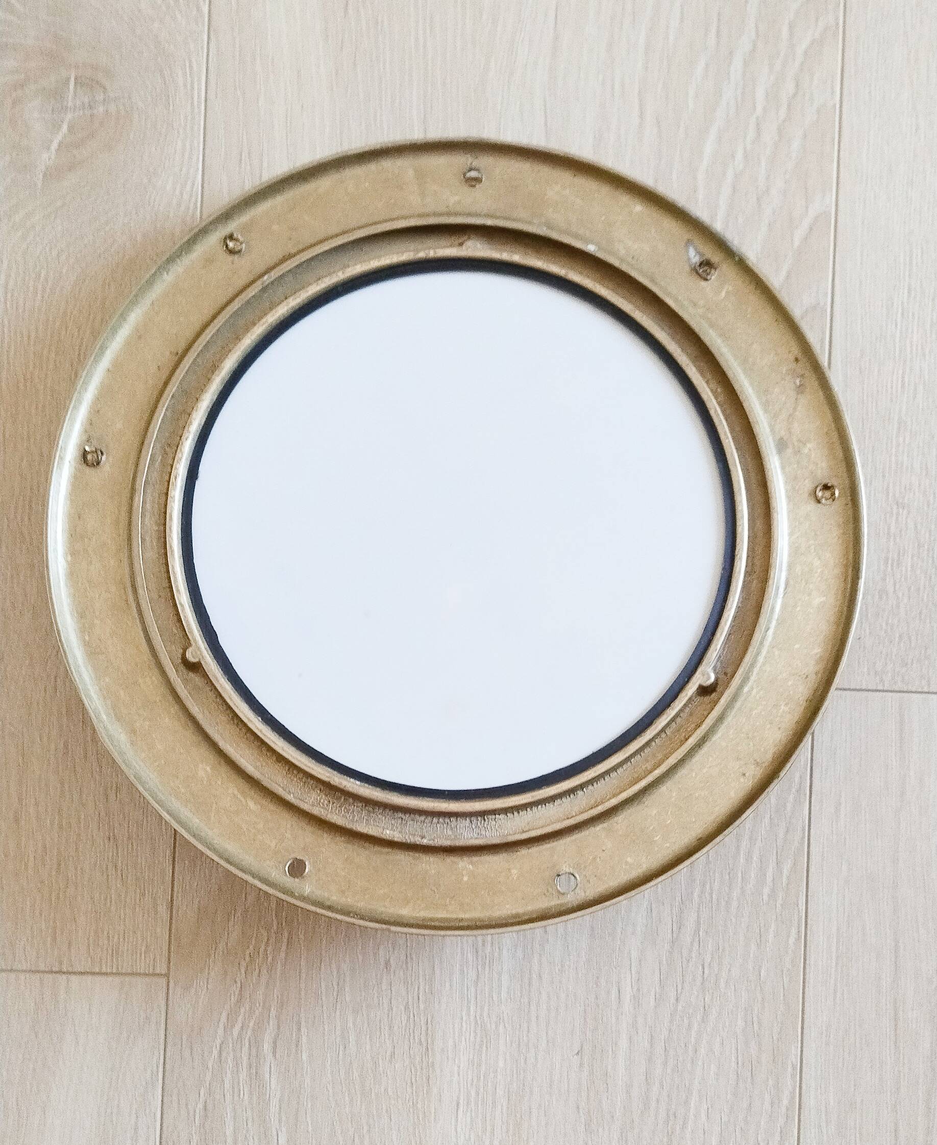 Porthole mirror in gilded brass, marine mirror