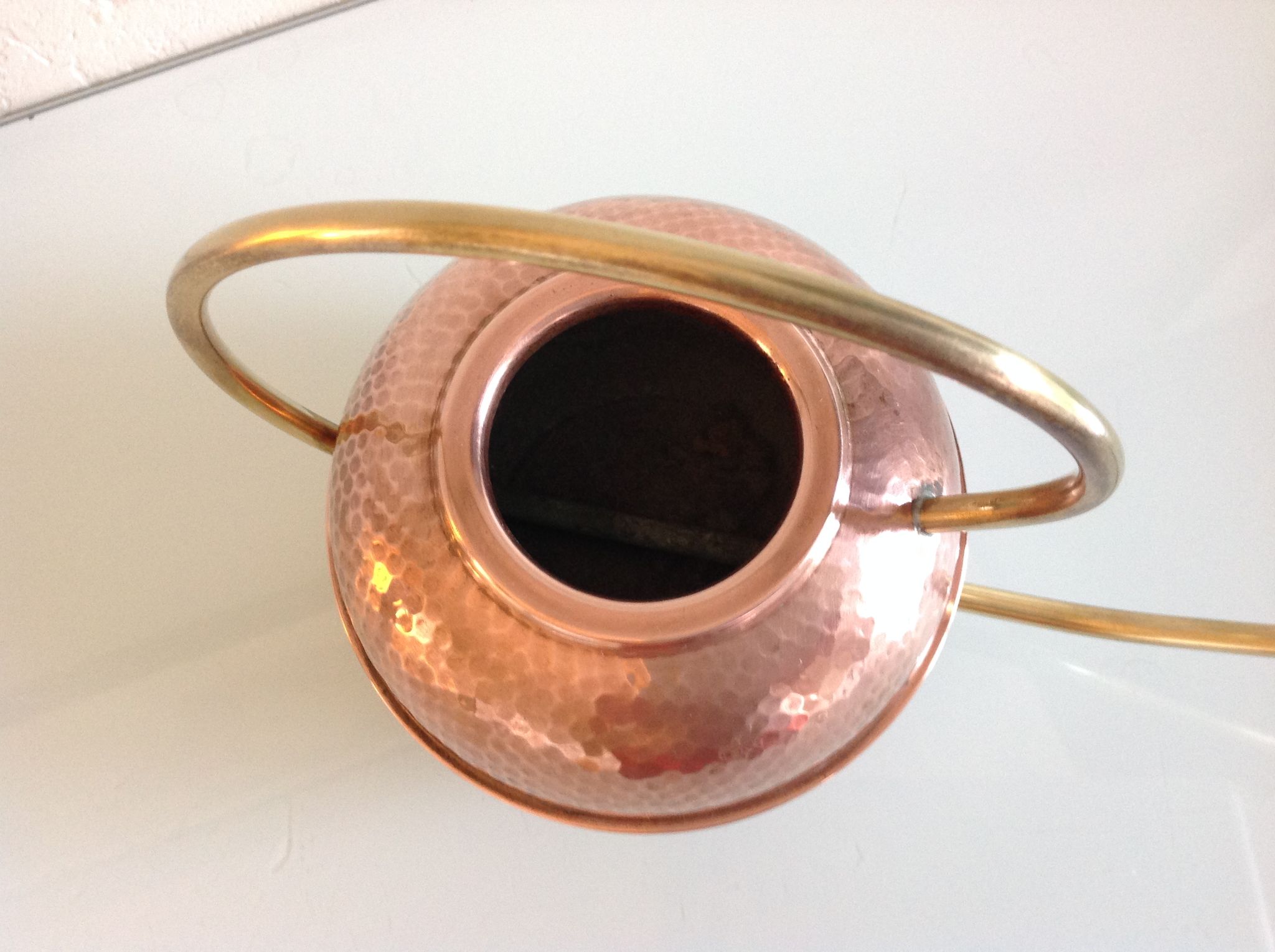 Red copper watering can in Scandinavian style 60s-70s