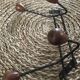 Old wrought iron coat rack. 4 hooks in chestnut wood