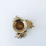 Candlestick in brass holly design