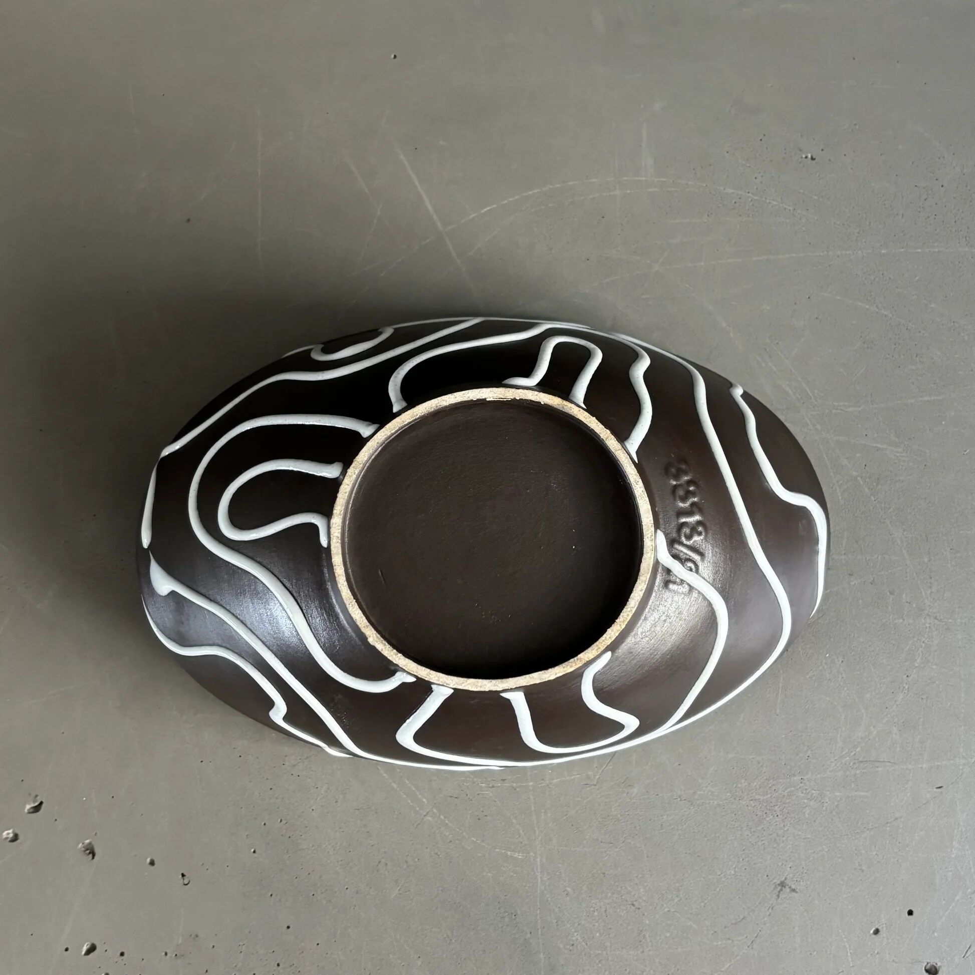 Yellow and black ceramic aperitif bowl, free form, West Germany.