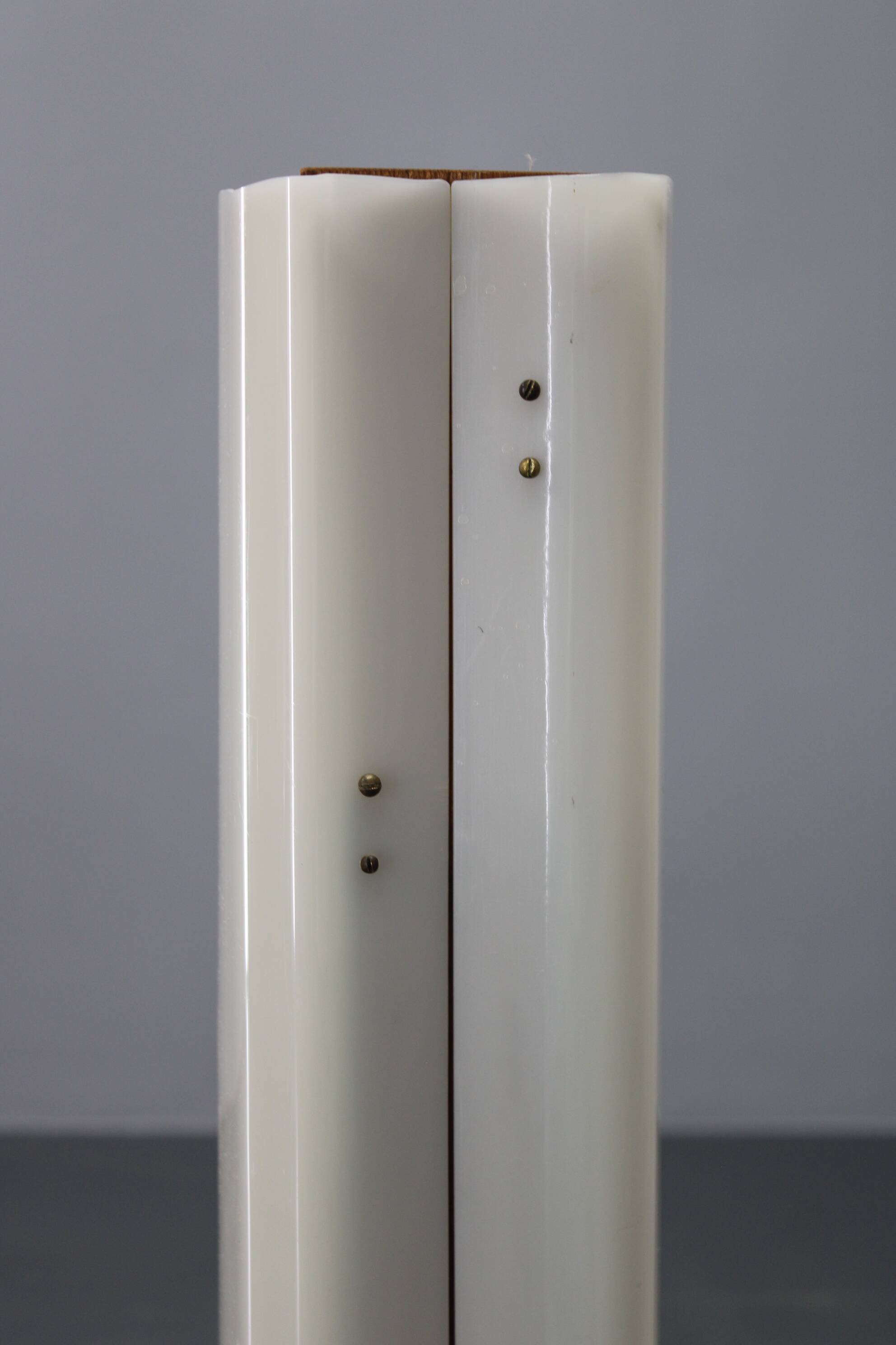 Mid-century modern floor lamp on iron legs with plastic shade and wood accent