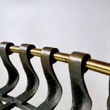 Old cast iron and brass log holder