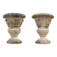 Pair of garden vases in reconstituted stone, Médicis shape, patinated.
