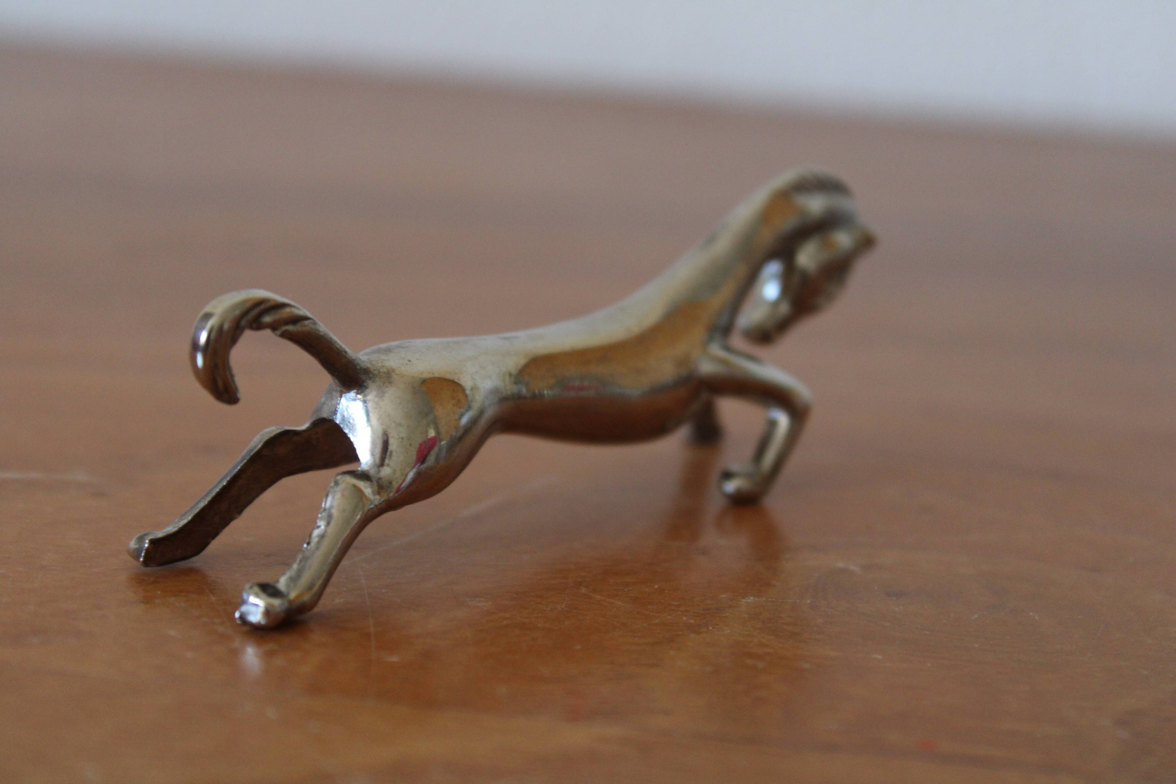 Set of 12 vintage knife rests, in silver metal