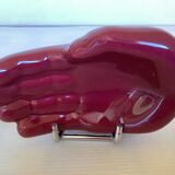 Burgundy hand emptier