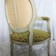Fauteuil médaillon à bras style Louis XVI