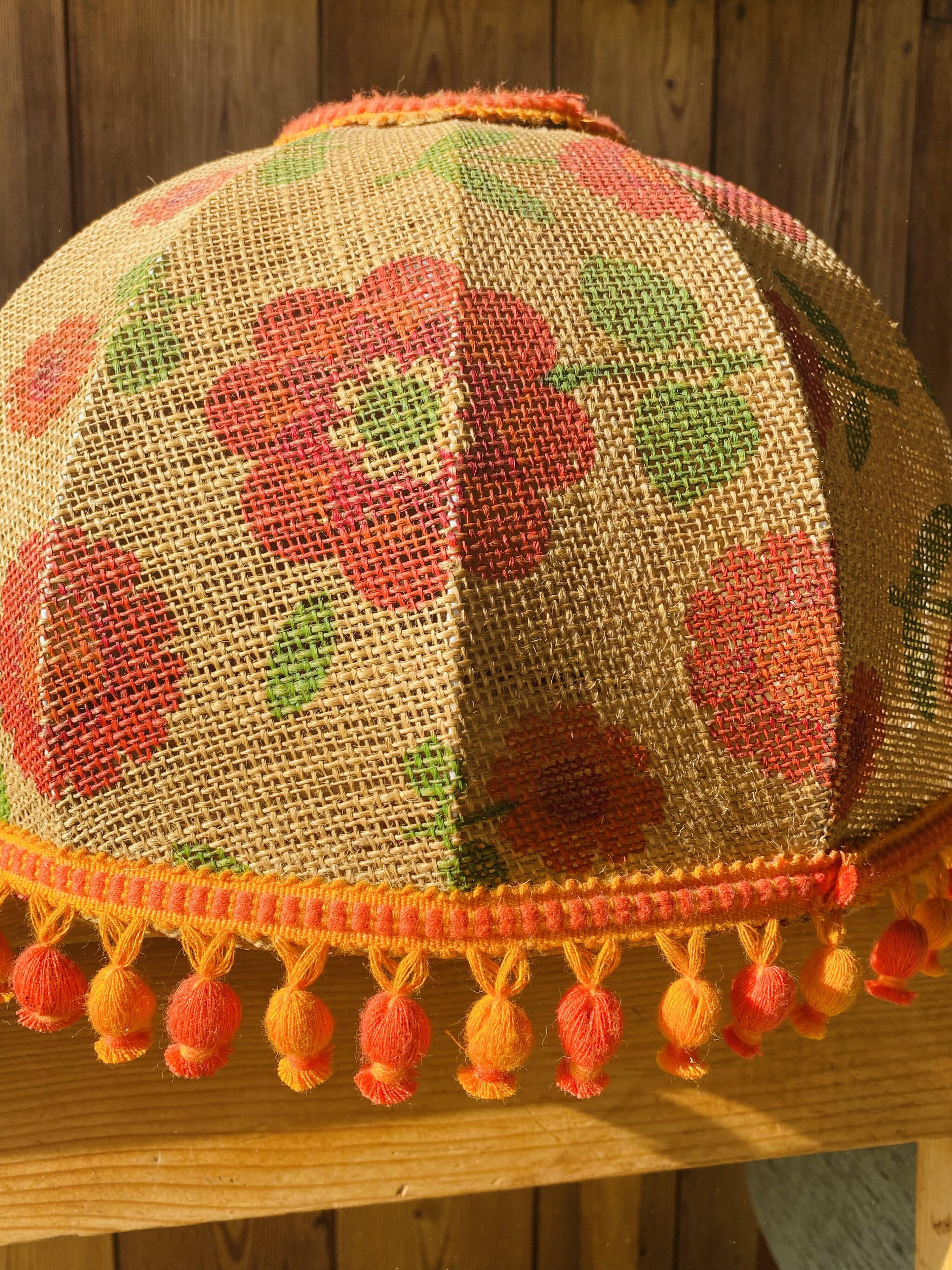 Vintage lampshade suspension with orange flower and ponpons