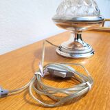 Rare flower stick mounted as a lamp
