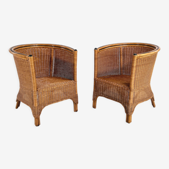 Pair of cabriolet armchairs in wicker and black edging