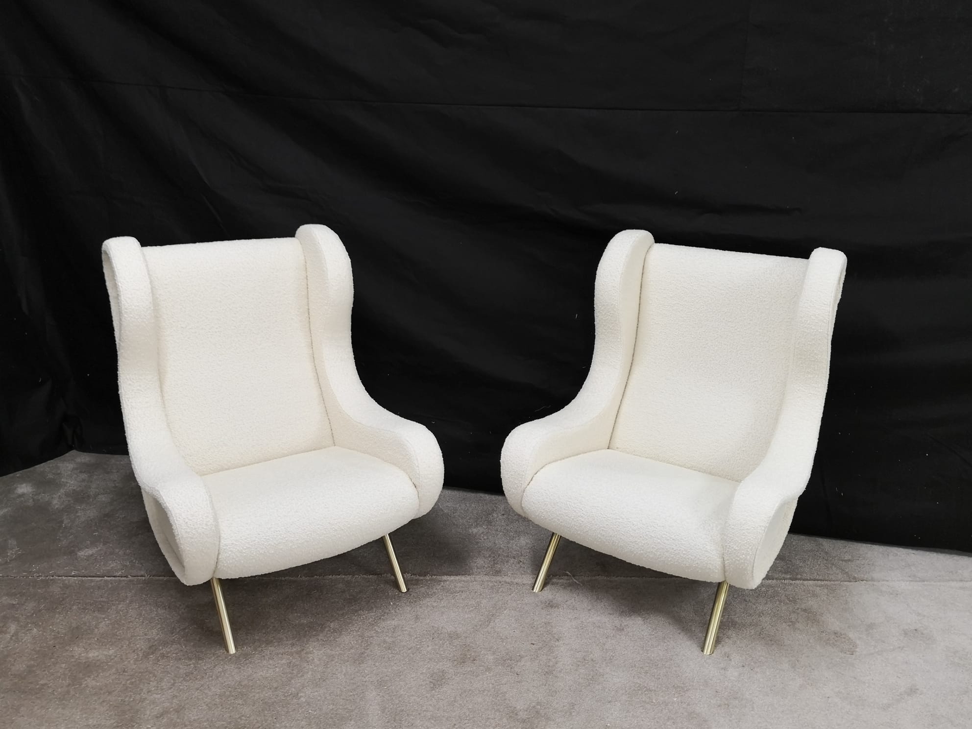 Pair of white buckle chairs