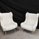 Paire de fauteuils bouclette blancs